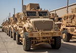 The Army Prepositioned Stock-5 M1224 MaxxPro mine-resistant ambush protected wheeled vehicles are prepared to be issued to the 44th Infantry Brigade Combat Team at Camp Arifjan, Kuwait, June 18, 2024. The M1224 MaxxPro MRAP wheeled vehicle is used as a deterrent in the Middle East to support missions during contingencies as well as major exercises and humanitarian missions. The 401st Army Field Support Brigade's headquarters is at Camp Arifjan, Kuwait and leverages the Army Materiel Enterprise to support strategic requirements in the U.S. Central Command area of responsibility. (U.S. Army Photo by Joseph Kumzak)