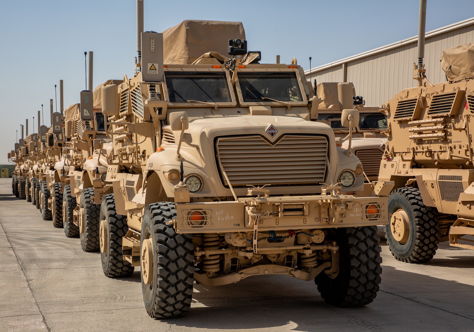 The Army Prepositioned Stock-5 M1224 MaxxPro mine-resistant ambush protected wheeled vehicles are prepared to be issued to the 44th Infantry Brigade Combat Team at Camp Arifjan, Kuwait, June 18, 2024. The M1224 MaxxPro MRAP wheeled vehicle is used as a deterrent in the Middle East to support missions during contingencies as well as major exercises and humanitarian missions. The 401st Army Field Support Brigade's headquarters is at Camp Arifjan, Kuwait and leverages the Army Materiel Enterprise to support strategic requirements in the U.S. Central Command area of responsibility. (U.S. Army Photo by Joseph Kumzak)