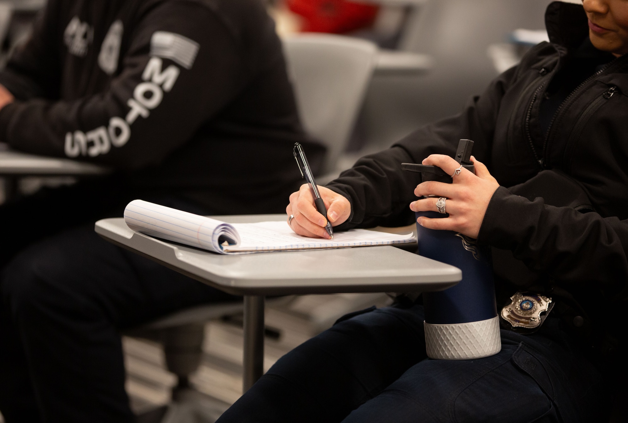 civilian people in a classroom setting