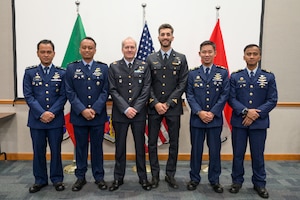 A photo of graduates posing.