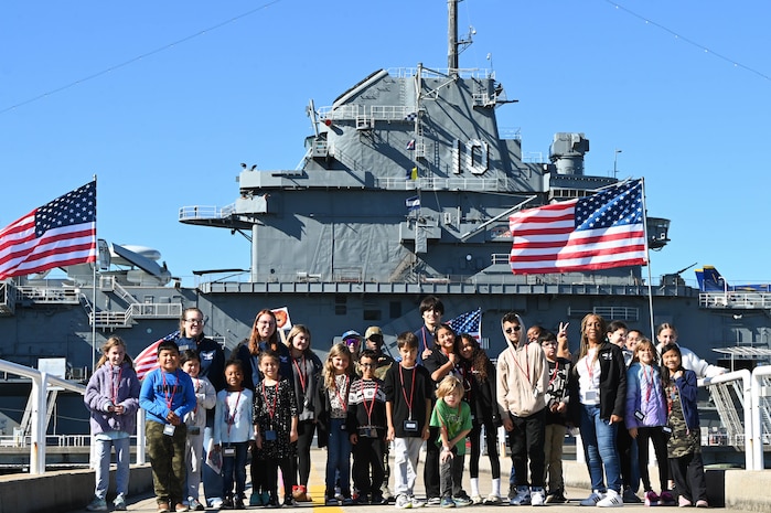 Children stand for a picture at Patriots Point Naval & Maritime Museum.