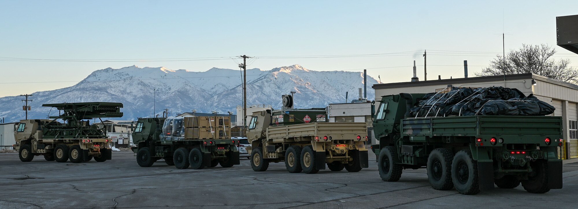 A convoy of vehicles from the 729th Air Control Squadron departs Hill Air Force Base, Utah, Jan. 15, 2025. The movement was part of a training inspection ahead of Red Flag 25-1. (U.S. Air Force photo by Garrett N. Cole)