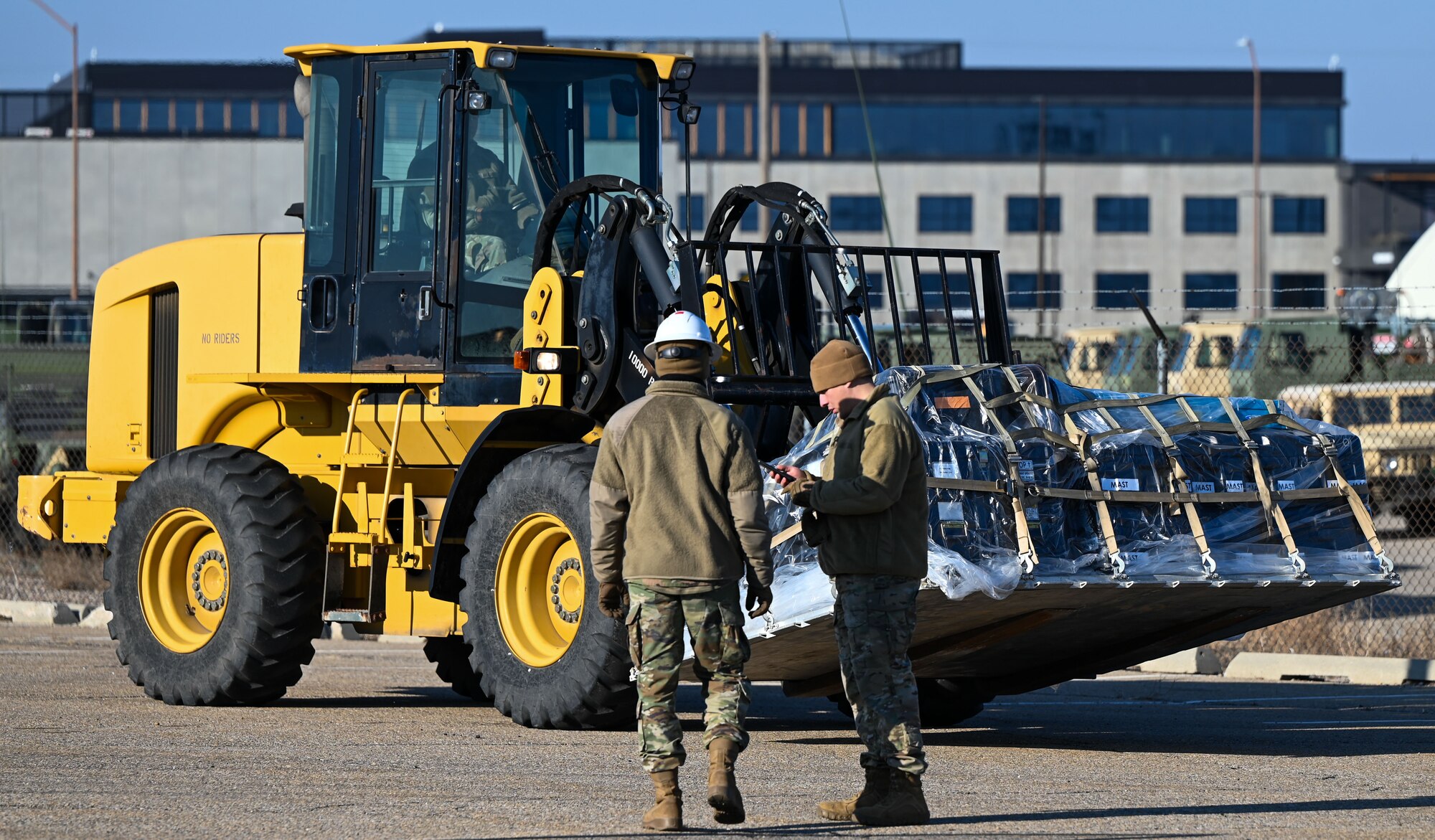 A forklift operator positions equipment onto a trailer at Hill Air Force Base, Utah, Jan. 16, 2025. The load was part of a simulated deployment exercise ahead of Red Flag 25-2.
(U.S. Air Force photo by Garrett N. Cole)