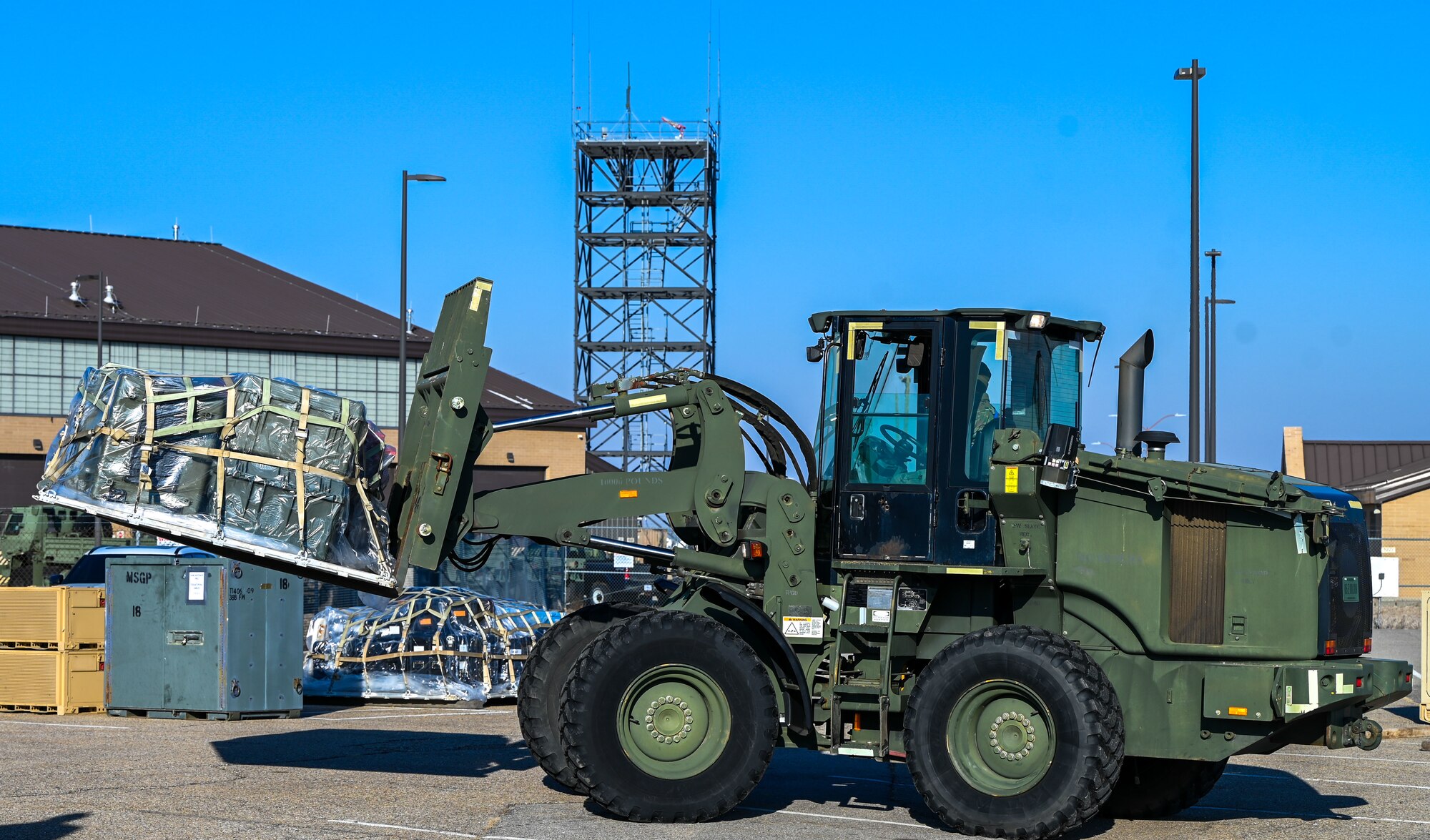An Airman operates a forklift to move deployment gear during an exercise at Hill Air Force Base, Utah, Jan. 16, 2025. The equipment was staged for transport ahead of Red Flag 25-2.
(U.S. Air Force photo by Garrett N. Cole)