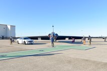 Local media, major news outlets, and aviation influencers document a U-2 Dragon Lady and a chase car at Beale Air Force Base, California, during a media day, April 2, 2025.