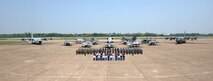 Distinguished visitors and Airmen from the Royal Thai Air Force, the U.S. Air Force, and the Republic of Singapore Air Force pose for a group photo after the Cope Tiger 25 closing ceremony at Korat Royal Air Base, Thailand Mar. 28, 2025.