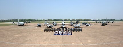 Distinguished visitors and Airmen from the Royal Thai Air Force, the U.S. Air Force, and the Republic of Singapore Air Force pose for a group photo after the Cope Tiger 25 closing ceremony at Korat Royal Air Base, Thailand Mar. 28, 2025.