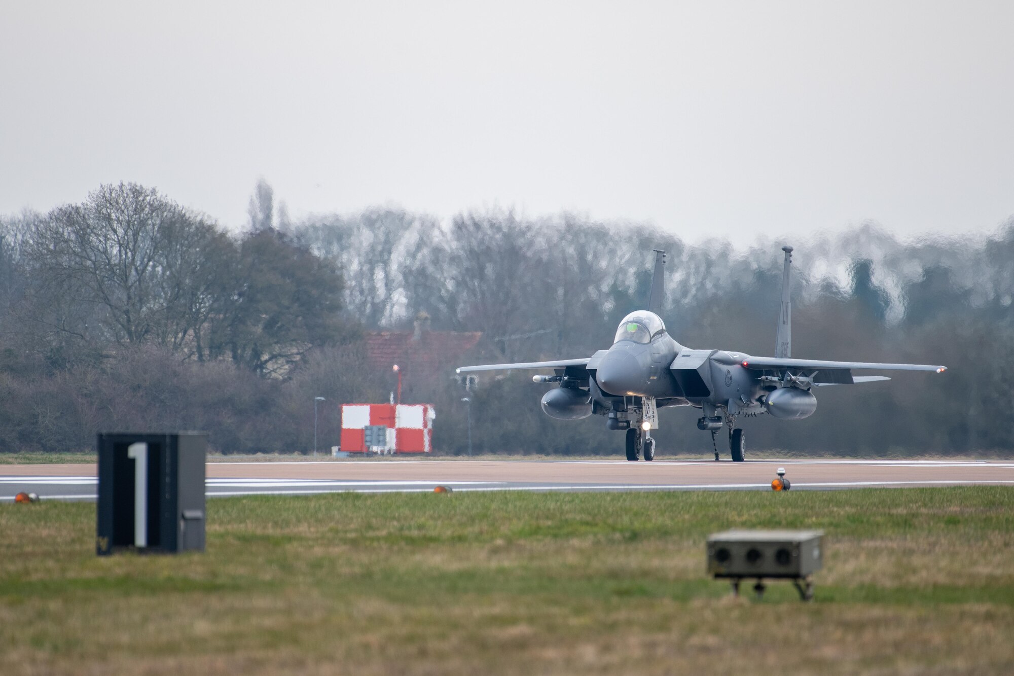A F-15E Strike Eagle prepares to test a Mobile Aircraft Arresting System