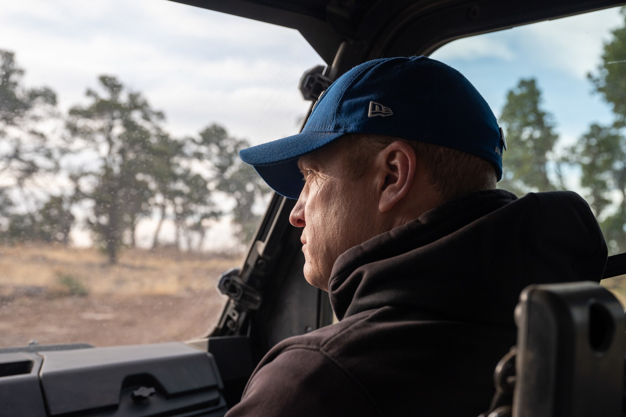 Col. Michael Power 377th Air Base Wing commander and installation commander, observes conservation efforts on Kirtland Air Force Bases withdrawn wildlife areas, March 31, on Kirtland Air Force Base, N.M. Kirtland Air Force Base is the largest installation in Air Force Global Strike Command and sixth largest in the United States Air Force. (U.S. Air Force photo by Airman 1st Class Donnell Schroeter)
