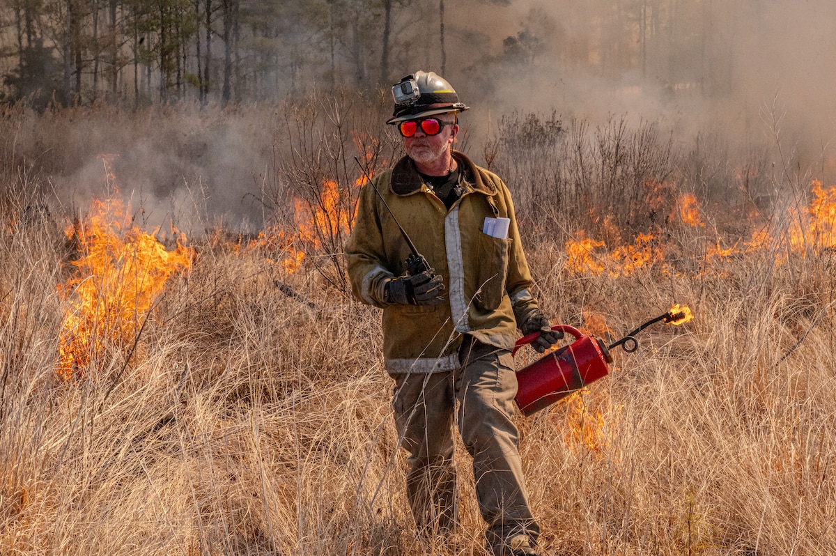 Firefighter uses his radio