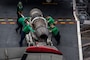Sailors assigned to the "Ragin' Bulls" of Strike Fighter Squadron (VFA) 37, move an F/A-18E Super Hornet engine across the flight deck of the world's largest aircraft carrier, USS Gerald R. Ford (CVN 78), March 31, 2025.