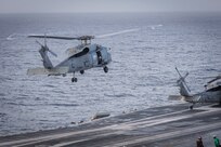 An MH-60R Sea Hawk, attached to the "Spartans" of Helicopter Maritime Strike Squadron (HSM) 70, takes off from the flight deck of the world's largest aircraft carrier, USS Gerald R. Ford (CVN 78), March 31, 2025.
