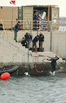 Seabees from Underwater Construction Team 1, Construction Dive Detachment ALFA, deployed under 22nd Naval Construction regiment, conduct dive training ensuring maritime infrastructure and underwater systems readiness aboard Naval Station Rota.