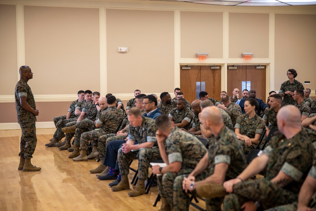 U.S. Marine Corps Lt. Gen. Melvin “Jerry” Carter, left, the Deputy Commandant for Information (DCI), answers questions during a townhall at Marine Corps Base Camp Lejeune, North Carolina, March 27, 2025. II Marine Information Group, II Marine Expeditionary Force, hosted the DCI, who briefed the future and impacts of information warfighting capabilities. (U.S. Marine Corps photo by Sgt. Jacquilyn Davis)