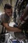 Aviation Machinist’s Mate Airman Recruit Michael Johns, assigned to aviation intermediate maintenance department aboard the world’s largest aircraft carrier, USS Gerald R. Ford (CVN 78), performs maintenance on a jet engine, March 29, 2025.