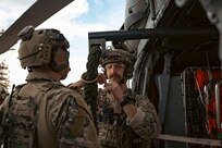 Sailors assigned to Explosive Ordnance Disposal Mobile Unit (EODMU) 12 check a fast rope on an MH-60S Sea Hawk, attached to the "Tridents" of Helicopter Sea Combat Squadron (HSC) 9, on the flight deck of the world's largest aircraft carrier, USS Gerald R. Ford (CVN 78), March 28, 2025.