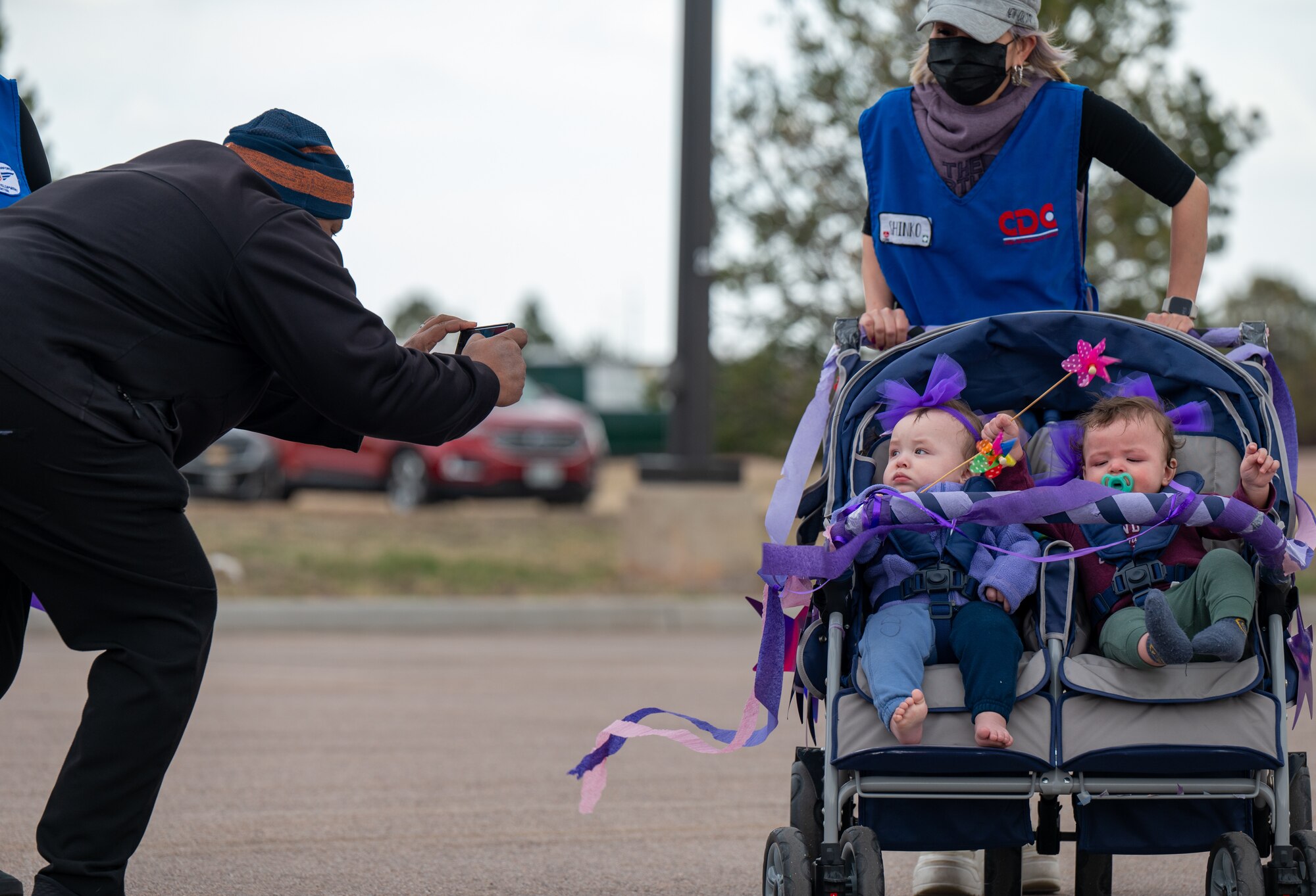 Children being pushed in a stroller
