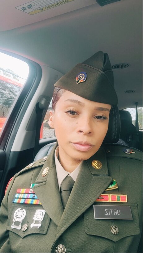 Female U.S. Army Soldier in uniform poses for selfie