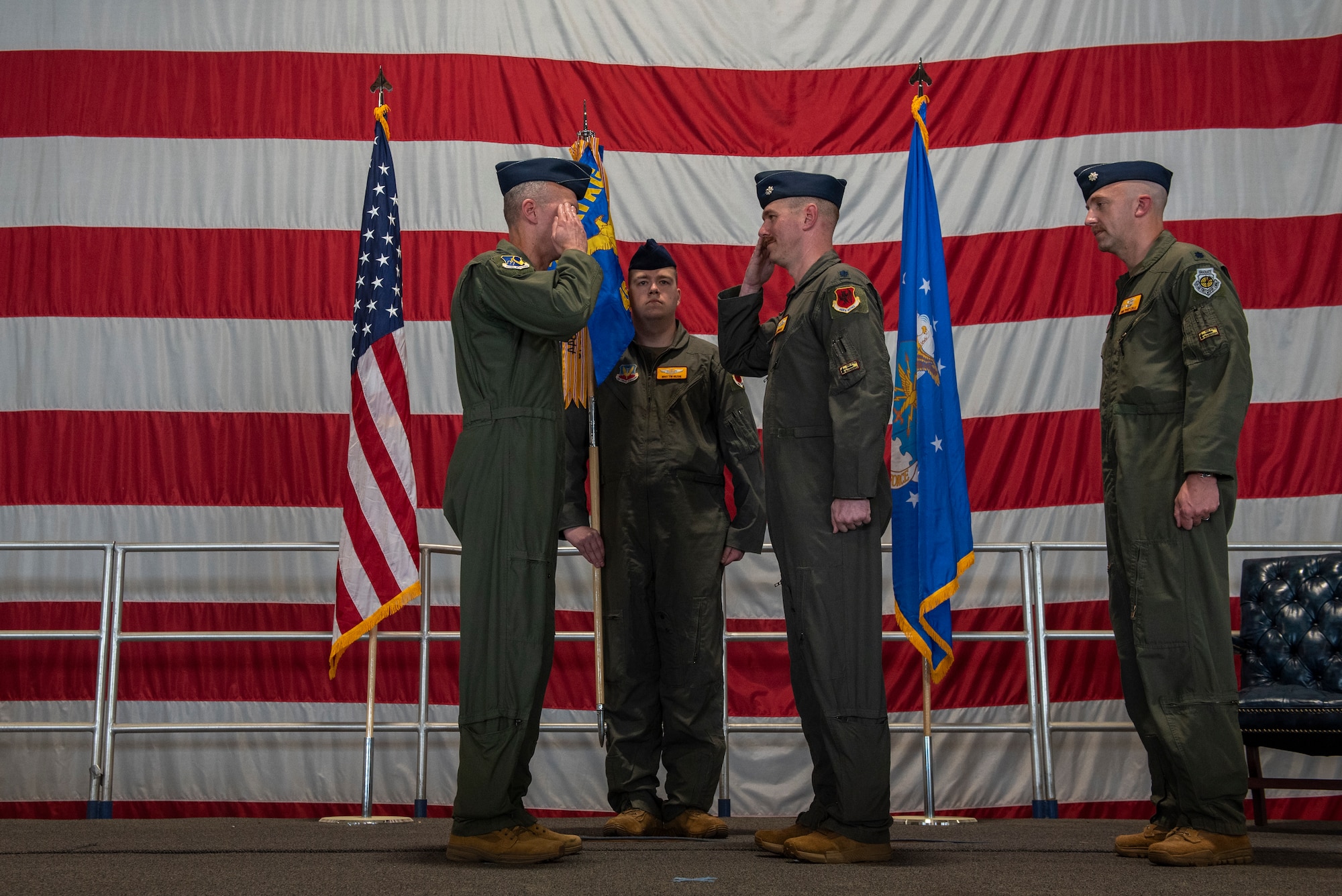 U.S. Air Force Lt. Col. Chad Swinehart, 482nd Attack Squadron outgoing commander, renders a salute to Col. Trevor Merrell, 25th Attack Group commander after passing the guidon during the 482nd ATKS change of command ceremony at Shaw Air Force Base, S.C., Mar. 28, 2025.