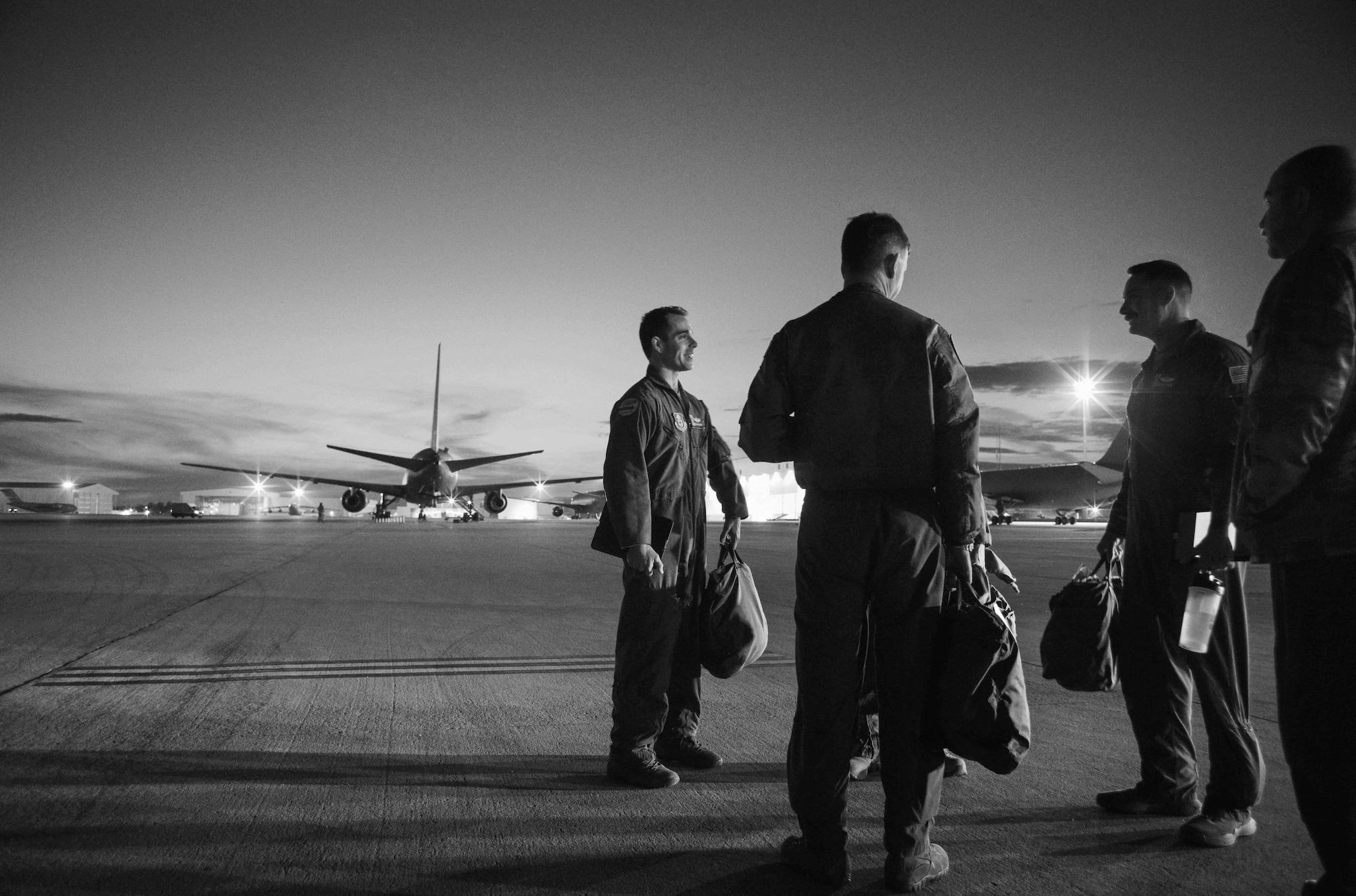 Airmen standing on flight-line before training demonstration.