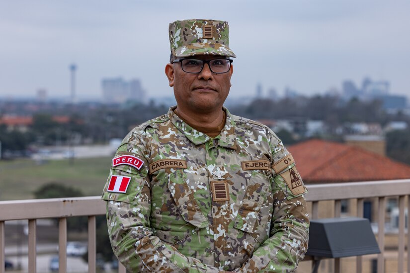 Peruvian army Col. Jose Cabrera Santa Cruz, partner nation liaison officer (PNLO) at U.S. Army South (USARSOUTH), stands on the terrace of the USARSOUTH headquarters at Fort Sam Houston, Texas, Feb. 18, 2024. Cabrera’s mission as a PNLO was to build upon the partnership between the U.S. and Peruvian armies, ensuring both forces are prepared to tackle regional and global challenges. (U.S. Army photo by Sgt. Joshua Taeckens)