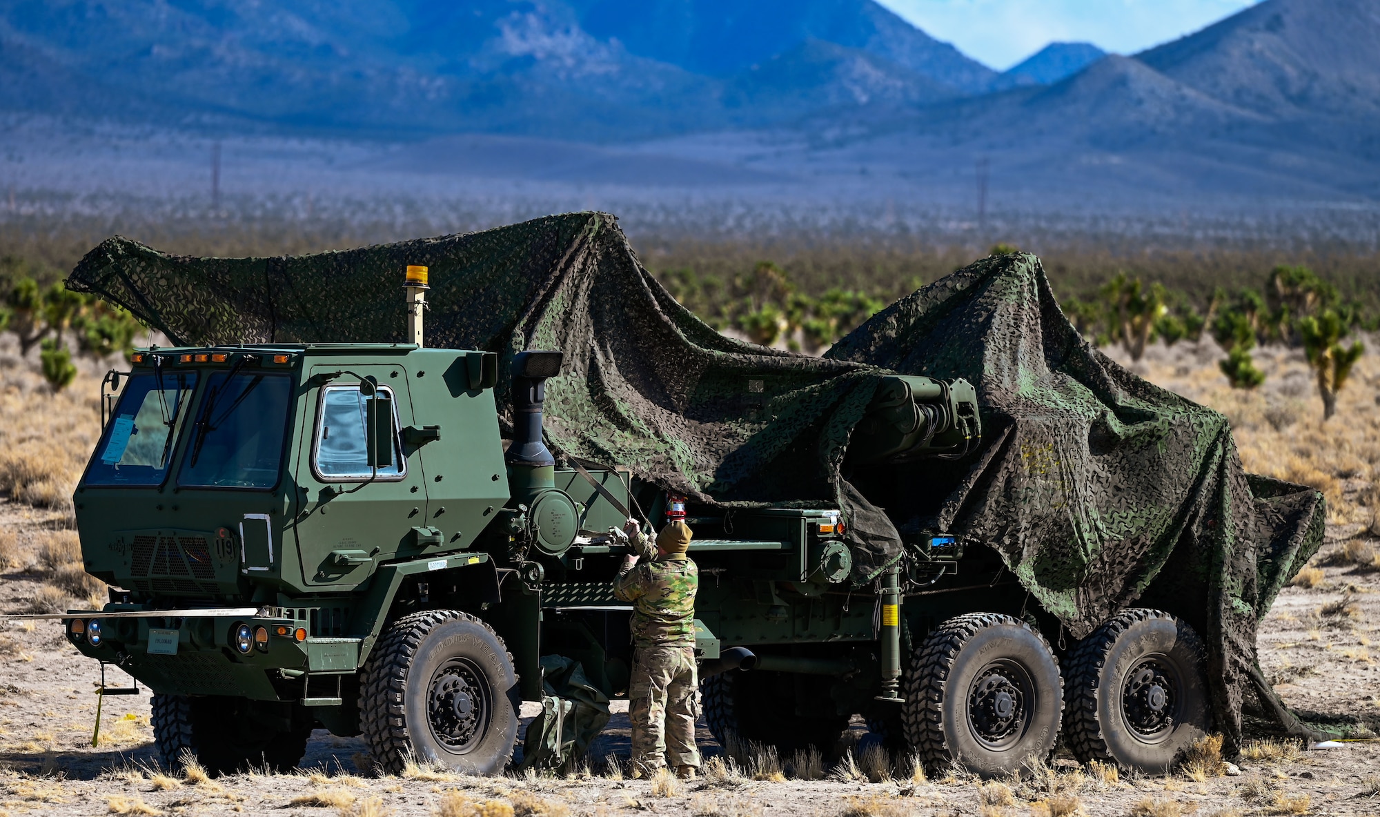 An Airman secures camouflage netting over a vehicle during a mock deployment at Hill Air Force Base, Utah, Feb. 4, 2025. The 729th Air Control Squadron is preparing for Red Flag 25-2 and Bamboo Eagle.
(U.S. Air Force photo by Garrett N. Cole)