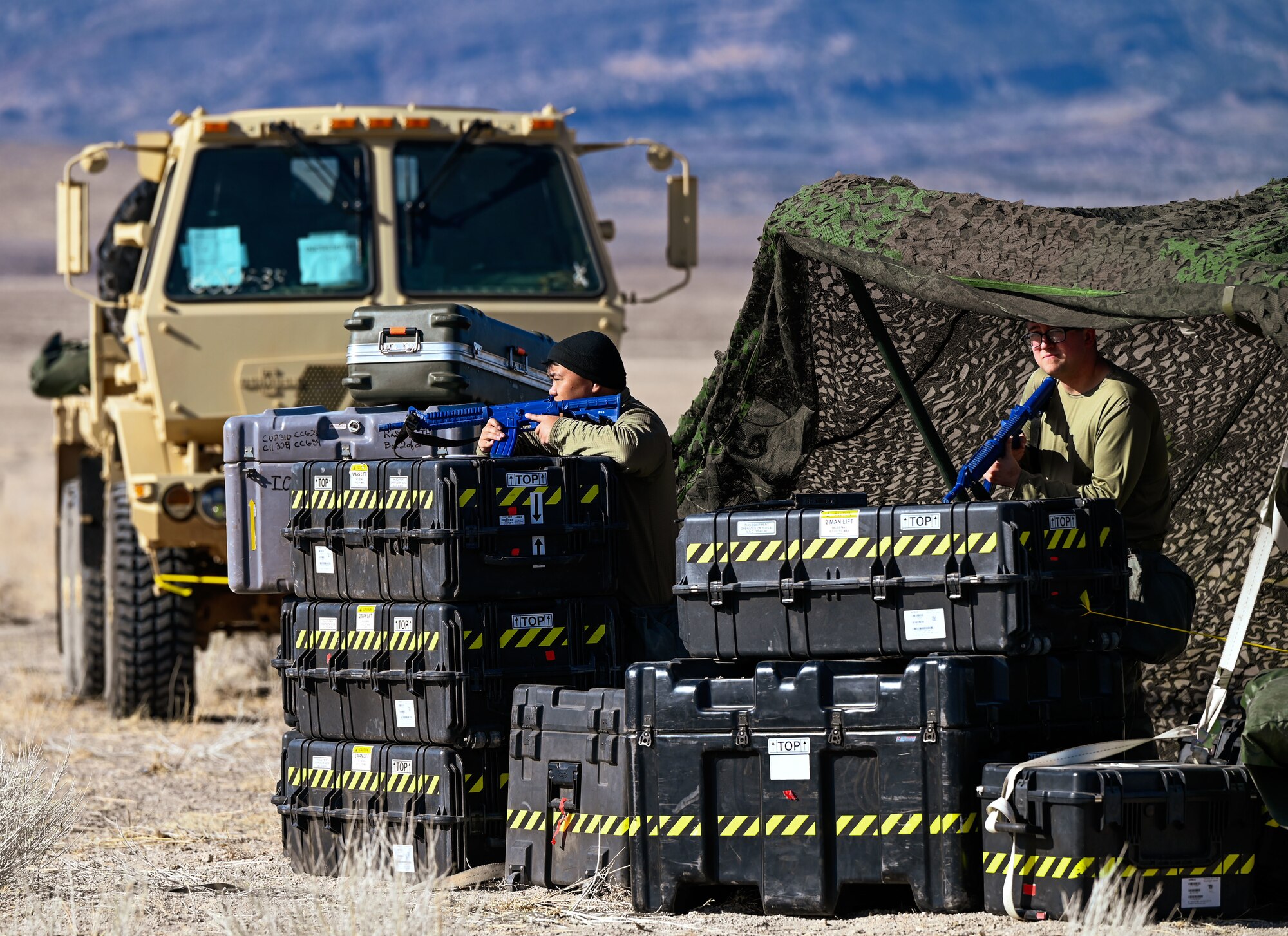 Airmen simulate defensive tactics while manning a field station during a mock deployment at Hill Air Force Base, Utah, Feb. 4, 2025. The exercise strengthens operational readiness for upcoming large-scale joint exercises.
(U.S. Air Force photo by Garrett N. Cole)