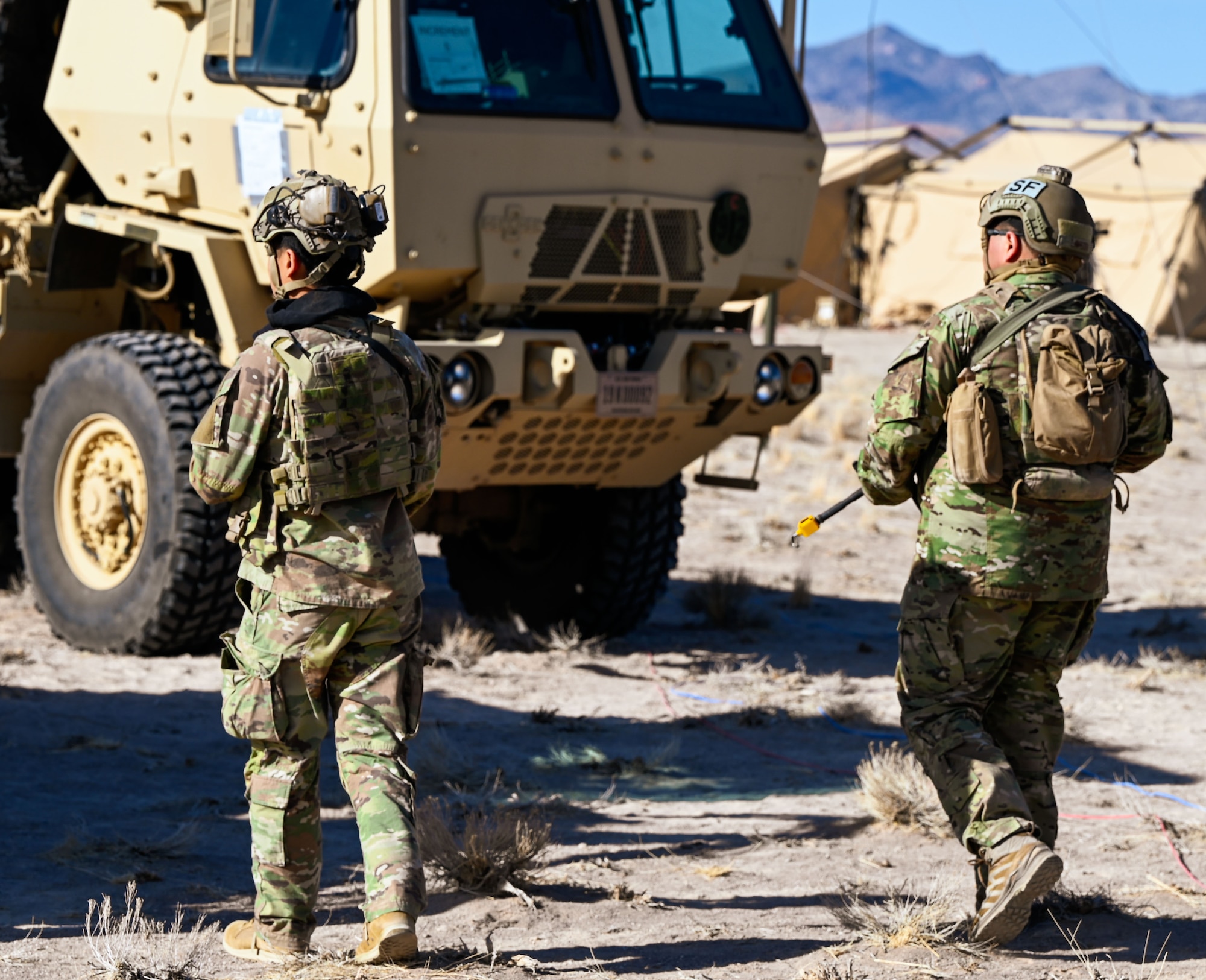 Two Airmen simulate a security patrol during a mock deployment at Hill Air Force Base, Utah, Feb. 4, 2025. The exercise is part of the 729th Air Control Squadron’s readiness training for upcoming missions.
(U.S. Air Force photo by Garrett N. Cole)