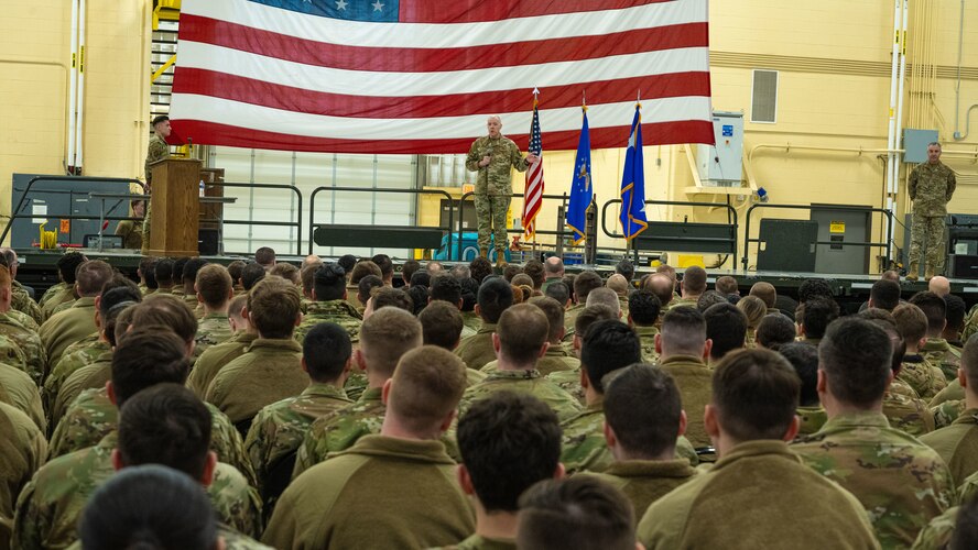 U.S. Air Force Gen. Thomas Bussiere speaks to a crowd of Airmen during an all-call.