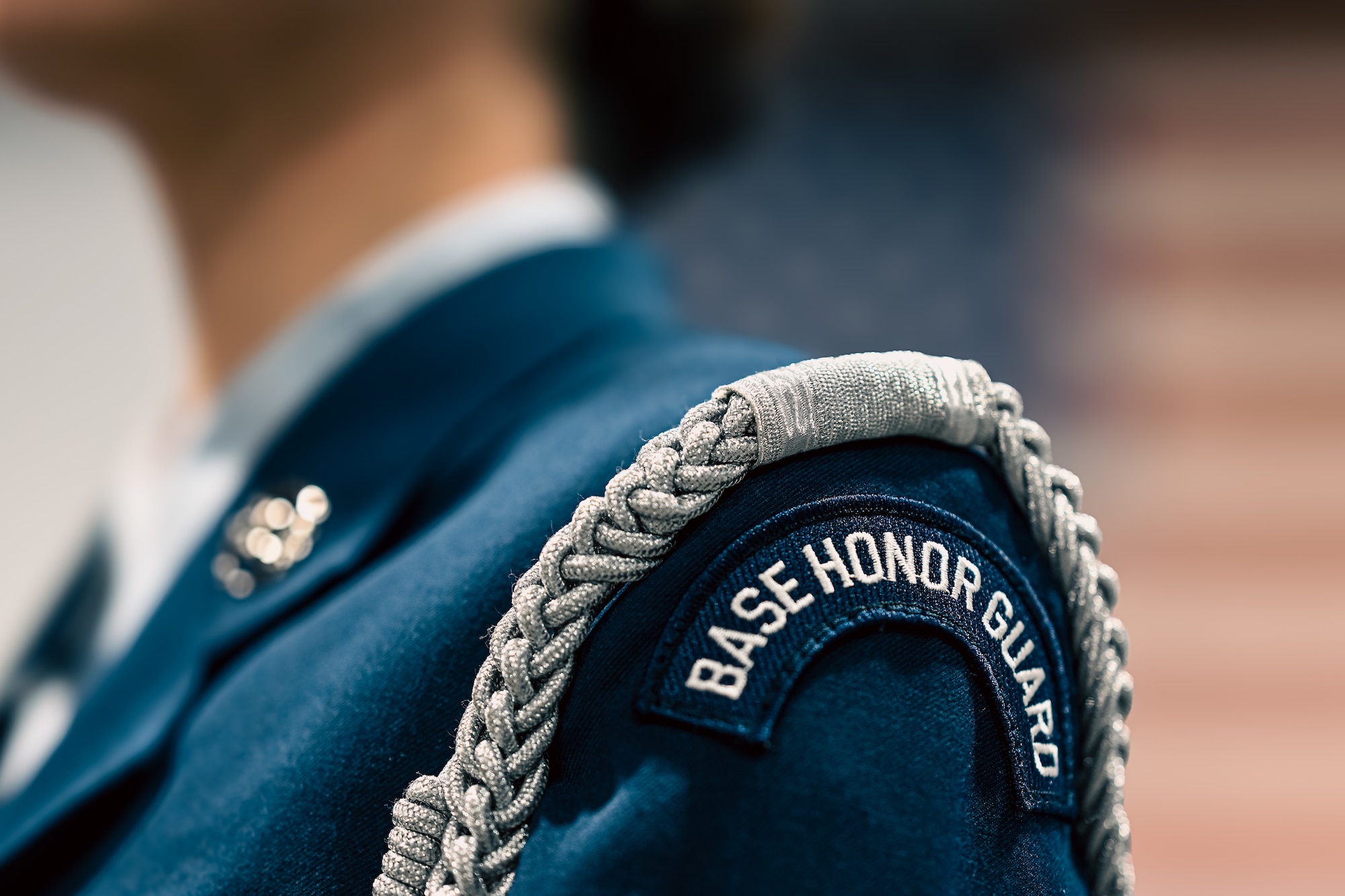 A close up of a service member's honor guard patch
