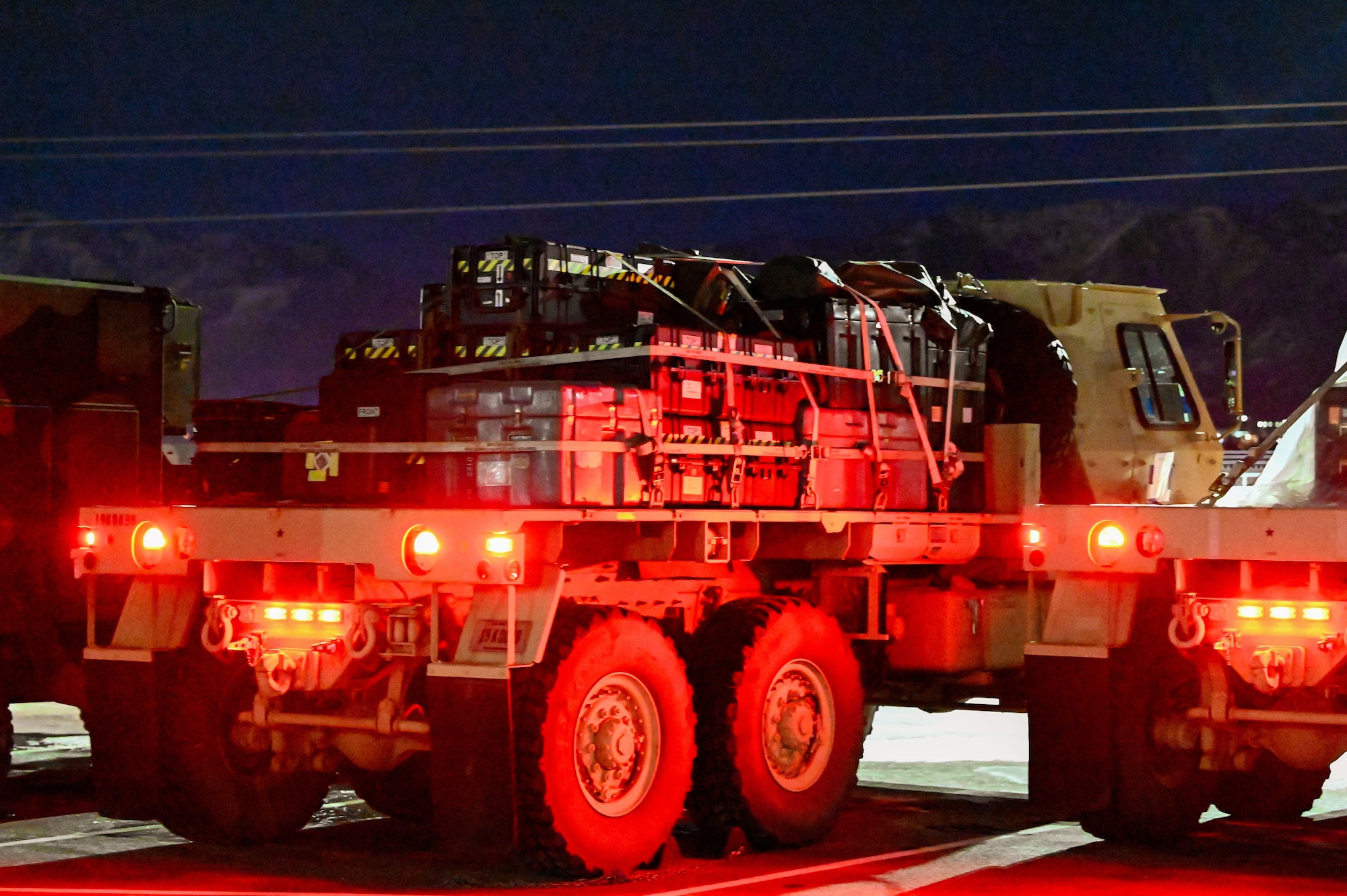 Crates of radar equipment are staged for convoy movement during a readiness drill at Hill Air Force Base, Utah, Jan. 9, 2025. The 729th Air Control Squadron began early-morning deployment operations for Exercise Bamboo Eagle.
(U.S. Air Force photo by Garrett N. Cole)