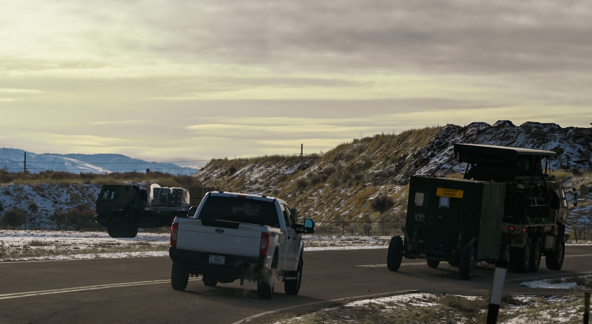 A convoy of radar and communications vehicles departs Hill Air Force Base, Utah, en route to Nellis Air Force Base, Nevada, for Red Flag 25-1. The large-scale exercise provides joint and coalition forces with realistic air combat training in a contested, degraded environment.
(U.S. Air Force photo by Garrett N. Cole)