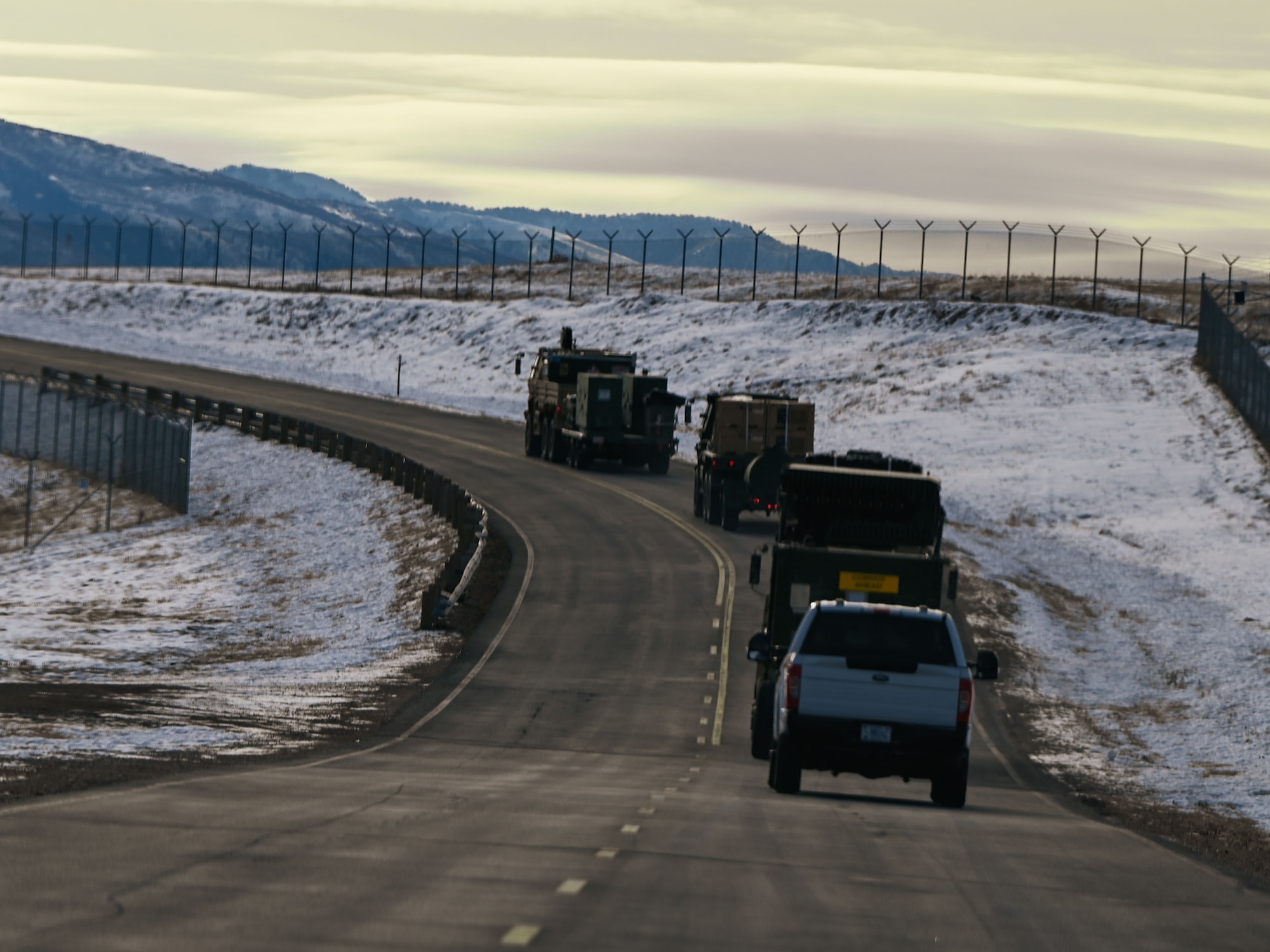 A convoy of radar and communications vehicles departs Hill Air Force Base, Utah, en route to Nellis Air Force Base, Nevada, for Red Flag 25-1. The large-scale exercise provides joint and coalition forces with realistic air combat training in a contested, degraded environment.
(U.S. Air Force photo by Garrett N. Cole)