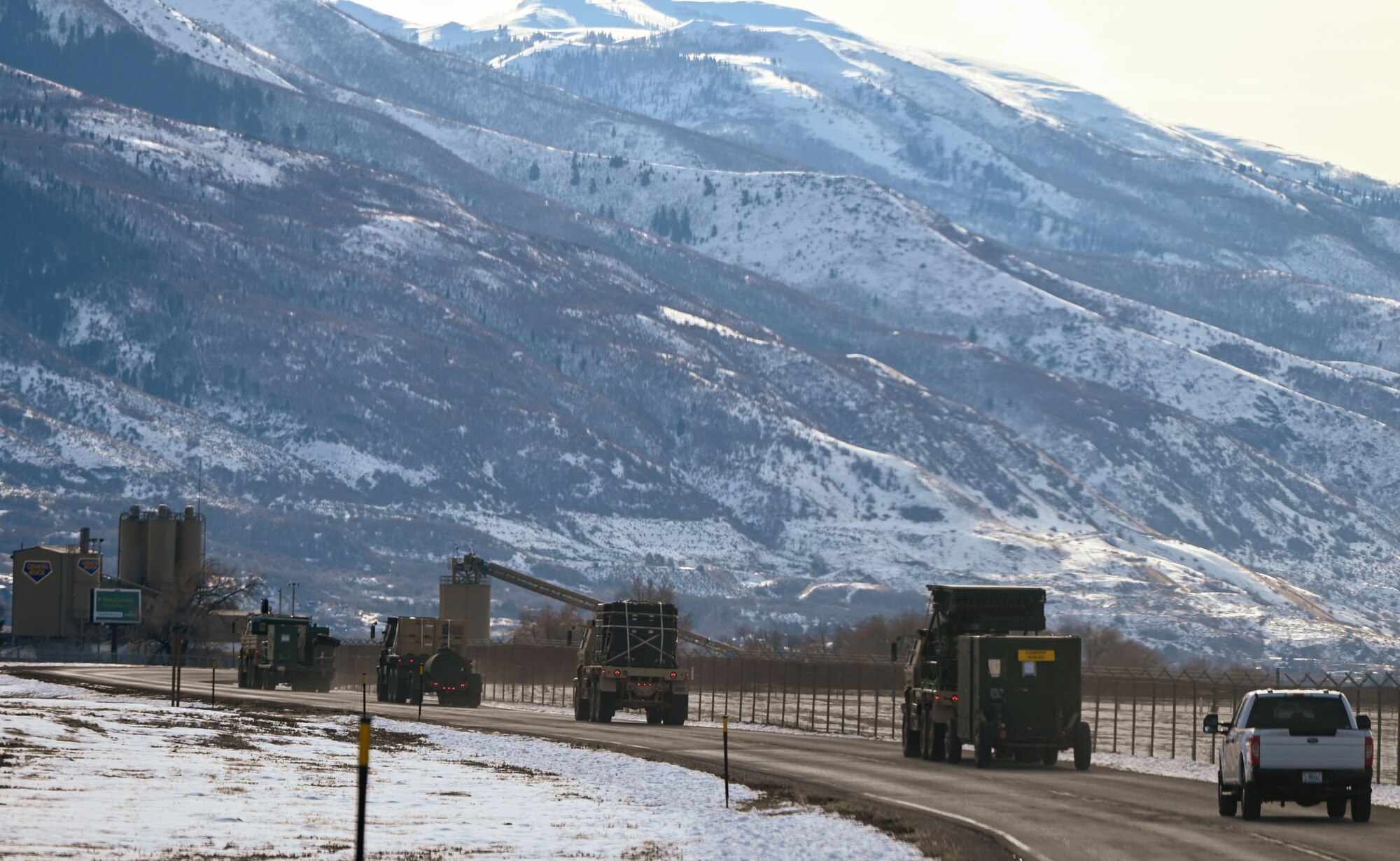 A convoy of radar and communications vehicles departs Hill Air Force Base, Utah, en route to Nellis Air Force Base, Nevada, for Red Flag 25-1. The large-scale exercise provides joint and coalition forces with realistic air combat training in a contested, degraded environment.
(U.S. Air Force photo by Garrett N. Cole)