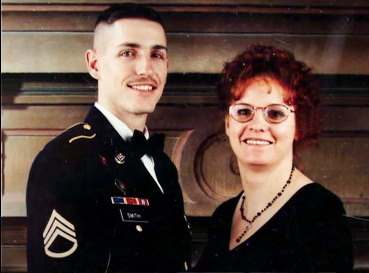 Two people pose for a photo.
