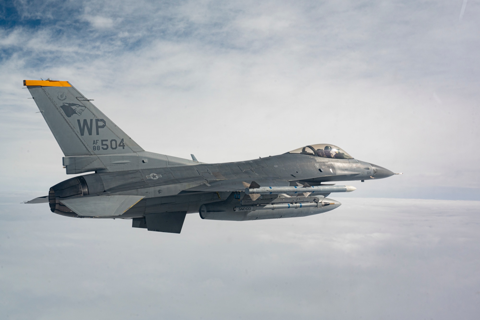 An F-16 Fighting Falcon aircraft assigned to the 80th Fighter Squadron flies over the Korean Peninsula.