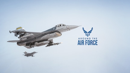 Two aircraft fly in the sky.