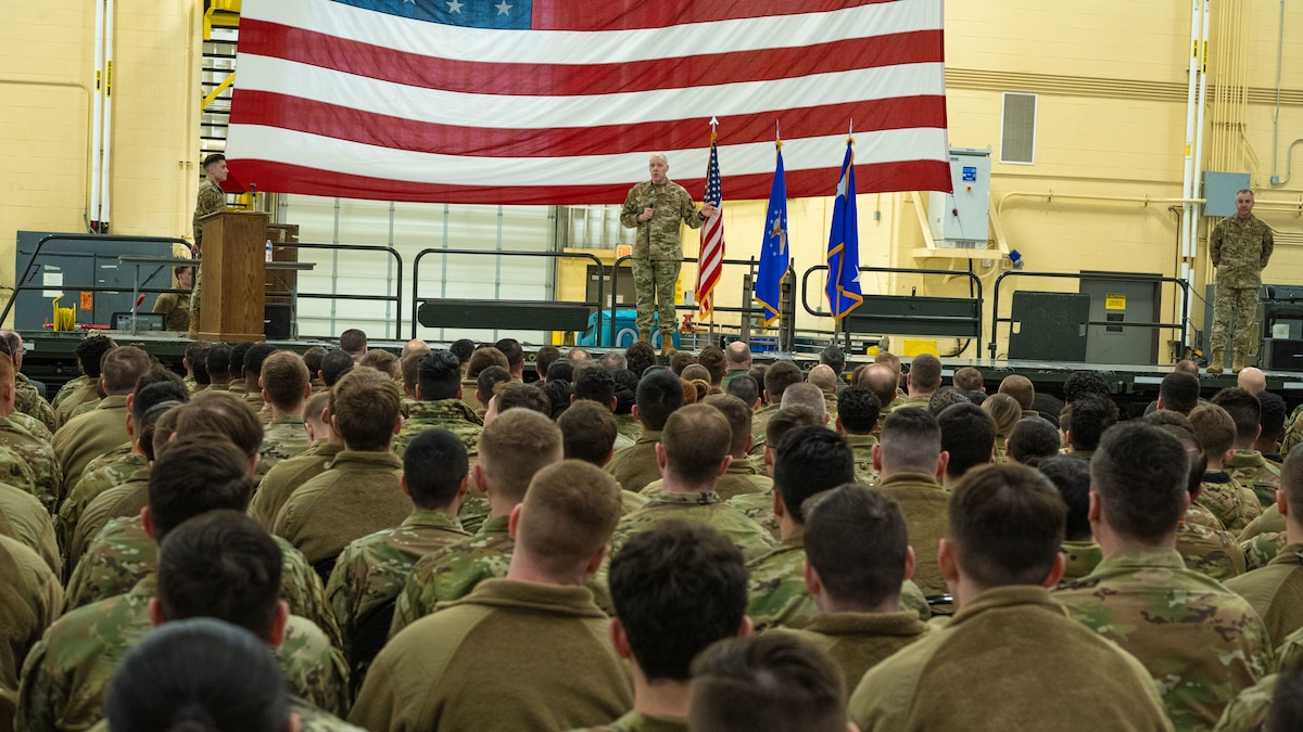 U.S. Air Force Gen. Thomas Bussiere speaks to a crowd of Airmen during an all-call.