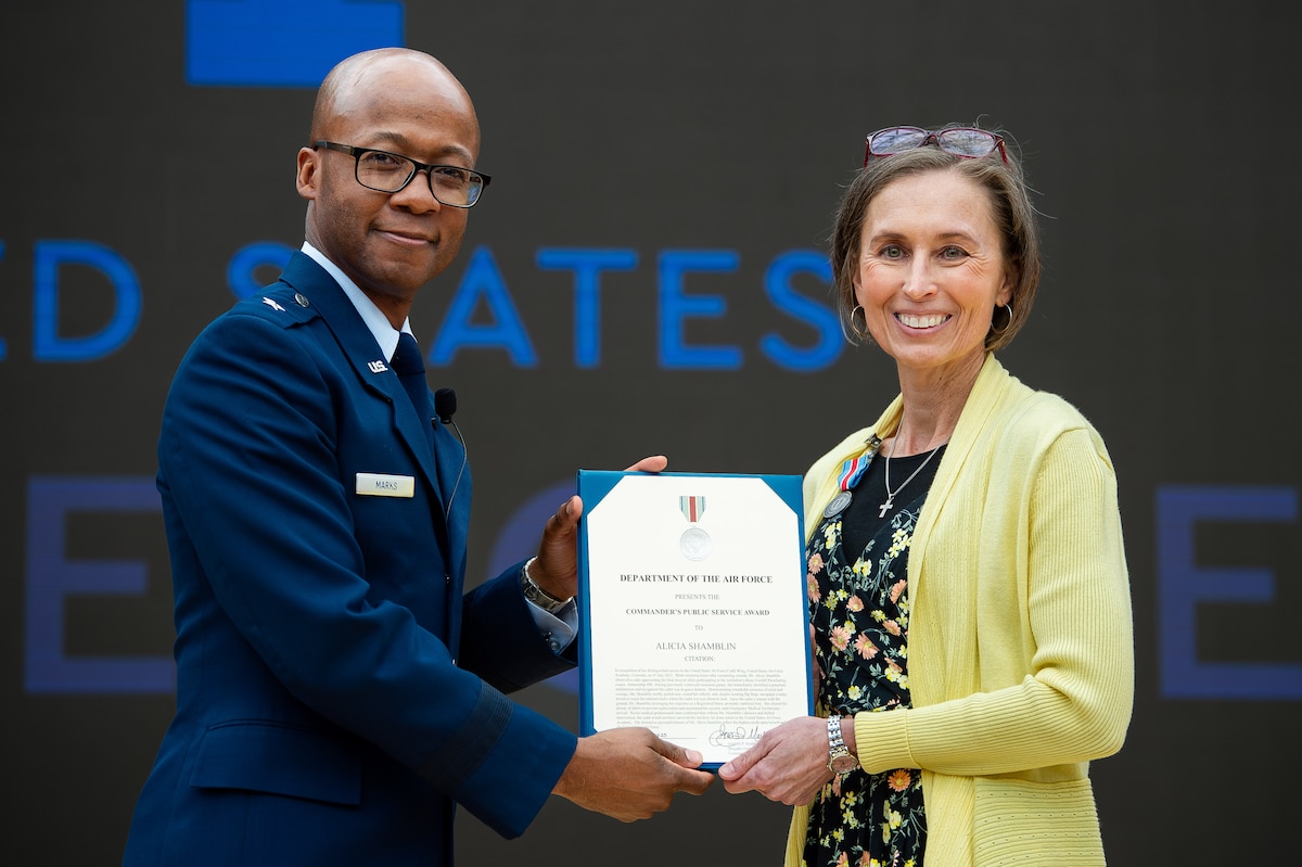 The U.S. Air Force Academy Cadet Wing recognized Mrs. Alicia Shamblin for her extraordinary actions that saved the life of a cadet during an award ceremony at Polaris Hall, March 31, 2025. Shamblin, a registered nurse and military spouse, was recognized for her swift response and medical expertise when she witnessed a parachuting accident on July 31, 2023. (U.S. Air Force photo by Dylan Smith)