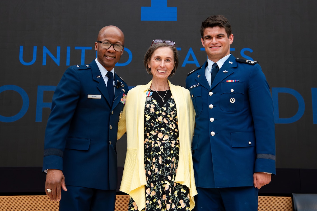 The U.S. Air Force Academy Cadet Wing recognized Mrs. Alicia Shamblin for her extraordinary actions that saved the life of a cadet during an award ceremony at Polaris Hall, March 31, 2025. Shamblin, a registered nurse and military spouse, was recognized for her swift response and medical expertise when she witnessed a parachuting accident on July 31, 2023. (U.S. Air Force photo by Dylan Smith)