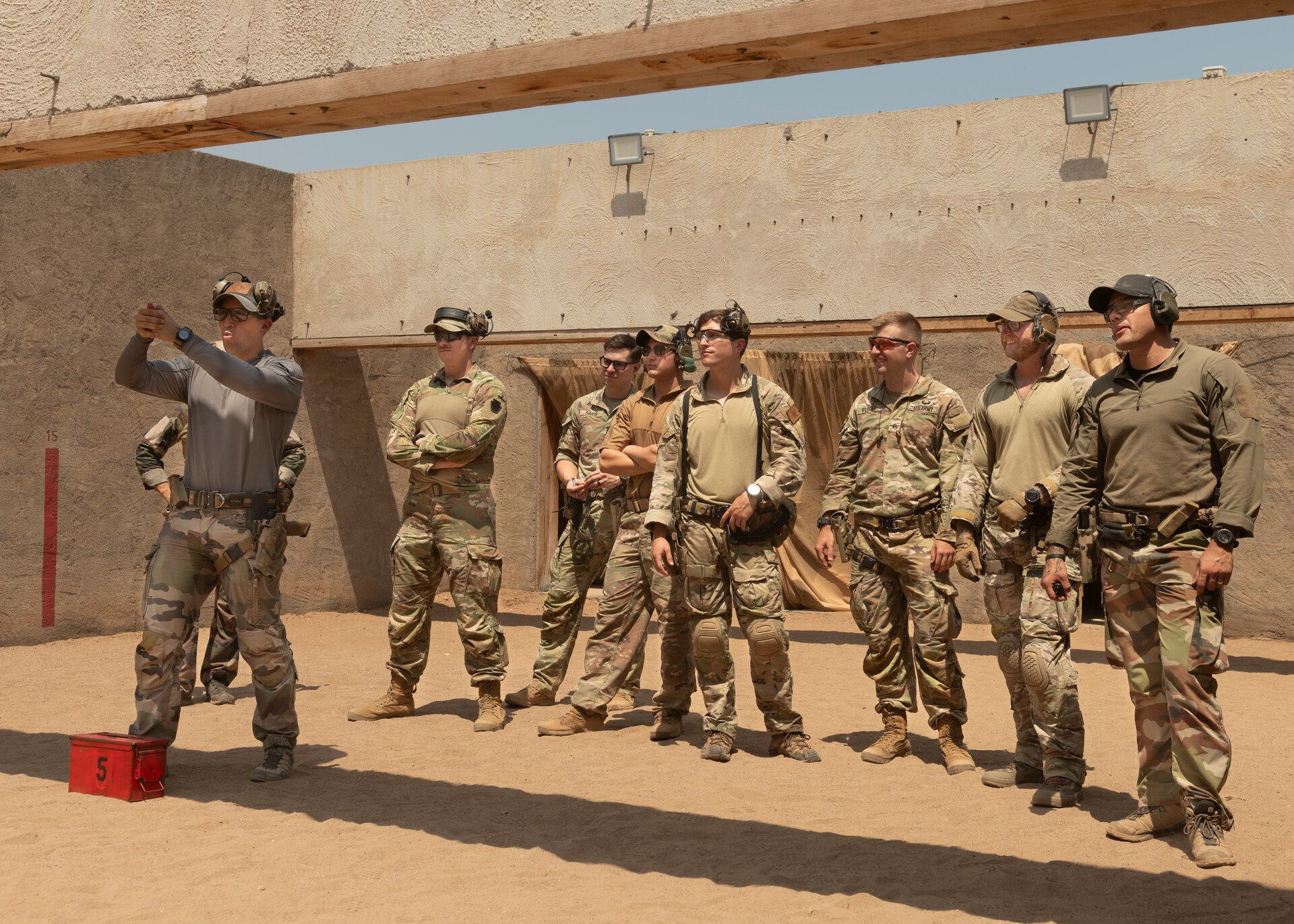 U.S. Army soldiers assigned to Task Force Associator conduct a joint pistol training exercise with the French 5th RIAOM at the 5e RIAOM French Army Base, Djibouti, March 4, 2025.