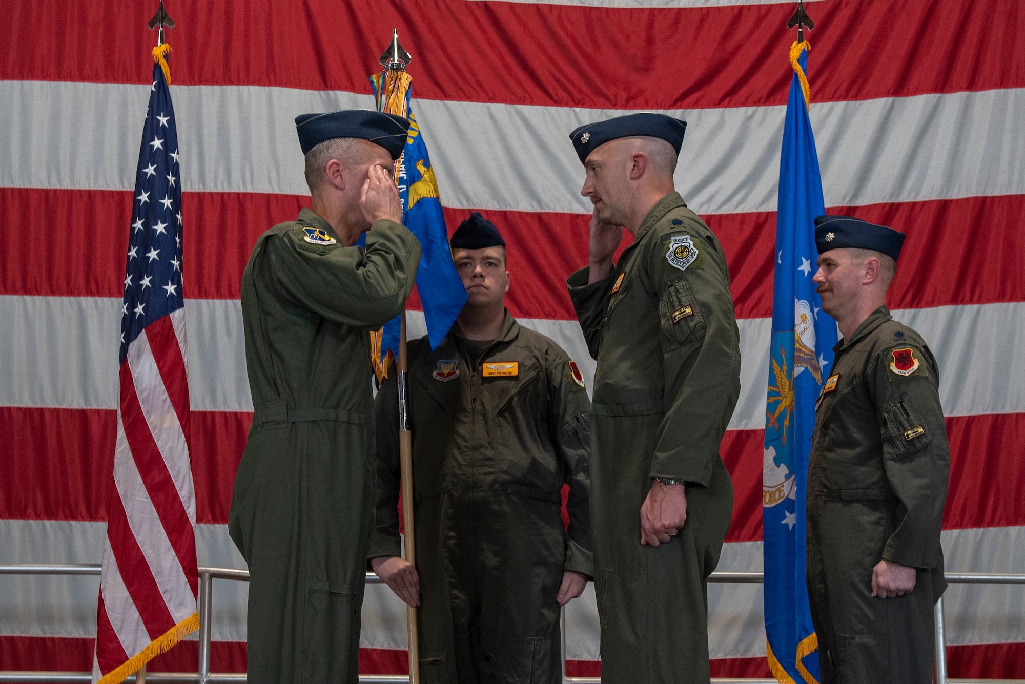 U.S. Air Force Lt. Col. Christopher Lyell’s renders a salute to Col. Trevor Merrell, 25th Attack Group commander after passing the guidon during the 482nd ATKS change of command ceremony at Shaw Air Force Base, S.C., Mar. 28, 2025.