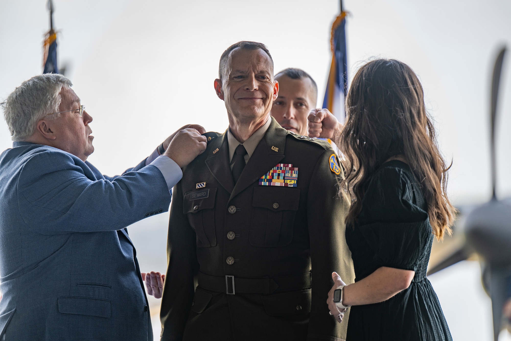 ceremony in an airport hanger