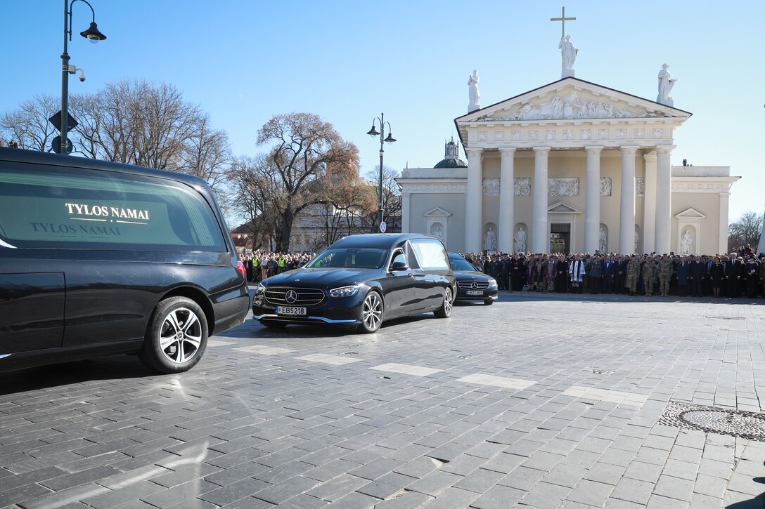 Four hearses escorting four fallen soldiers