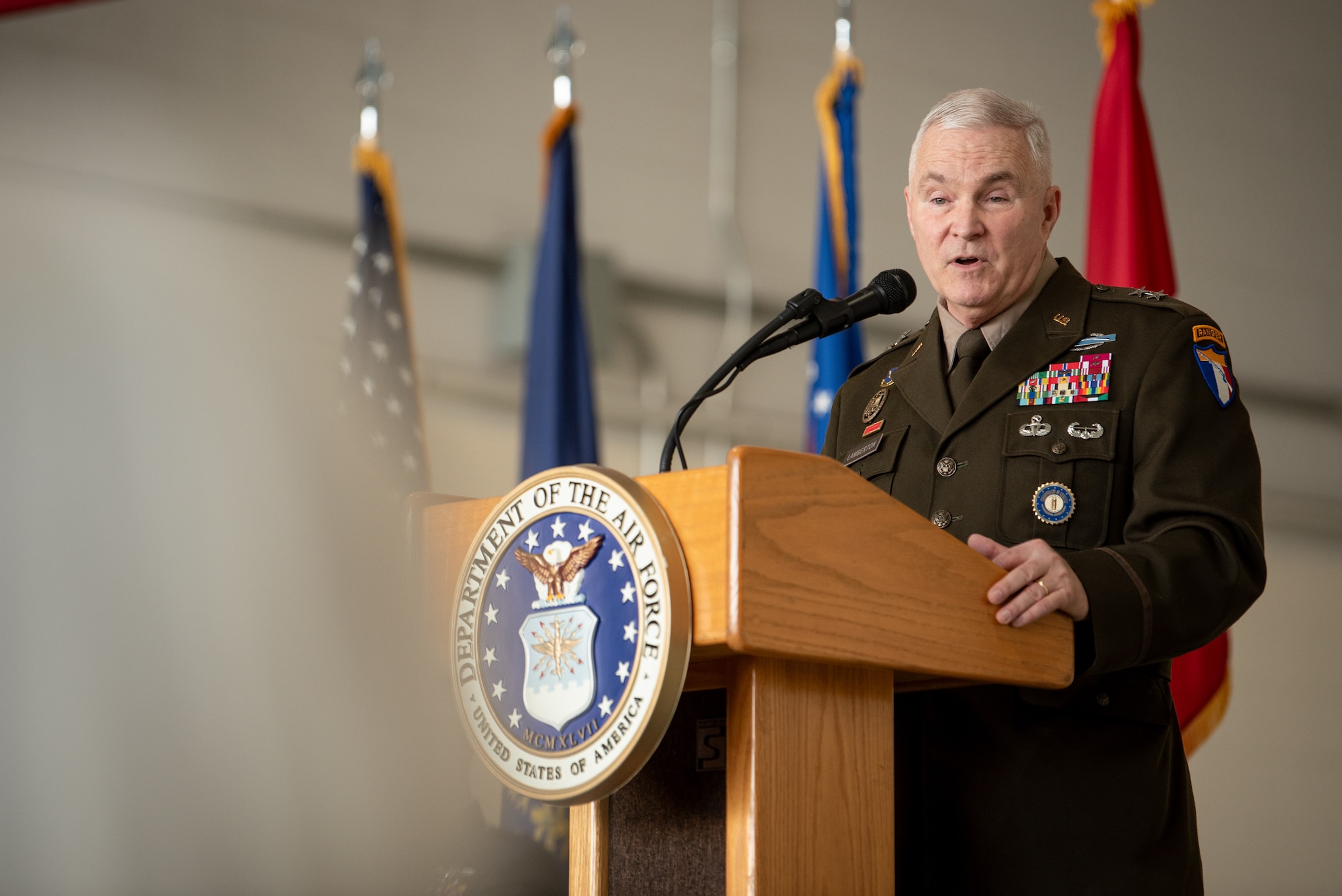 U.S. Army Maj. Gen. Haldane Lamberton, adjutant general of the Commonwealth of Kentucky, speaks during a change-of-command ceremony at the Kentucky Air National Guard Base in Louisville, Ky., March 14, 2025. The ceremony installed U.S. Air Force Brig. Gen. Bruce Bancroft as the state’s new assistant adjutant general for Air, replacing U.S. Air Force Brig. Gen. David Mounkes, who is retiring. (U.S. Air National Guard photo by Master Sgt. Joshua Horton)
