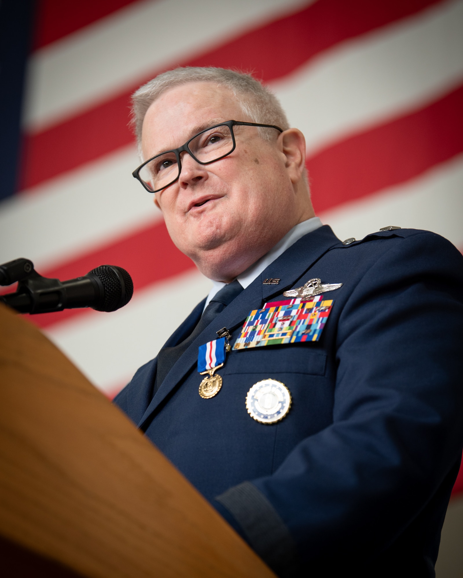 Brig. Gen. David Mounkes, Kentucky’s outgoing assistant adjutant general for Air, speaks during a change-of-command ceremony at the Kentucky Air National Guard Base in Louisville, Ky., March 14, 2025. Brig. Gen. Bruce Bancroft is replacing Mounkes, who is retiring from military service after a 35-year career in the active-duty Air Force and Air National Guard.  (U.S. Air National Guard photo by Master Sgt. Joshua Horton)