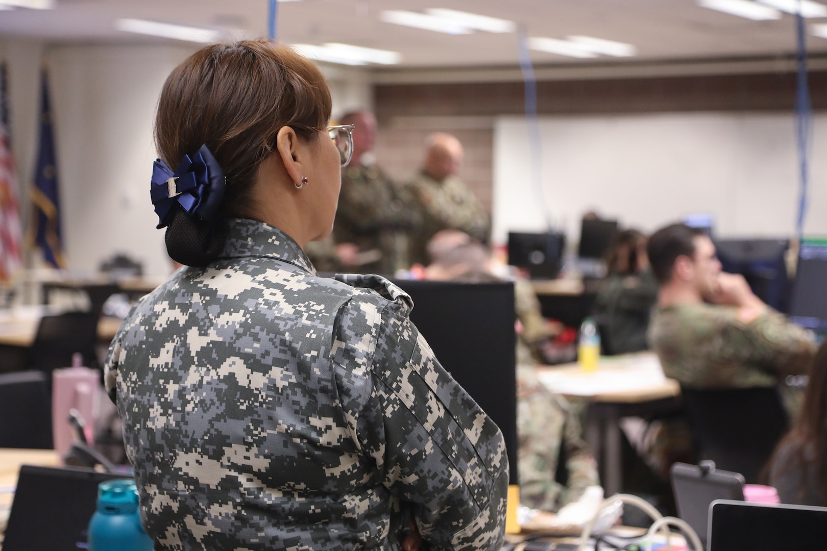 A member of the Mongolian Armed Forces observes a briefing during exercise Vigilant Guard 2025, at Joint Base Elmendorf-Richardson, Alaska, March 6, 2025.
