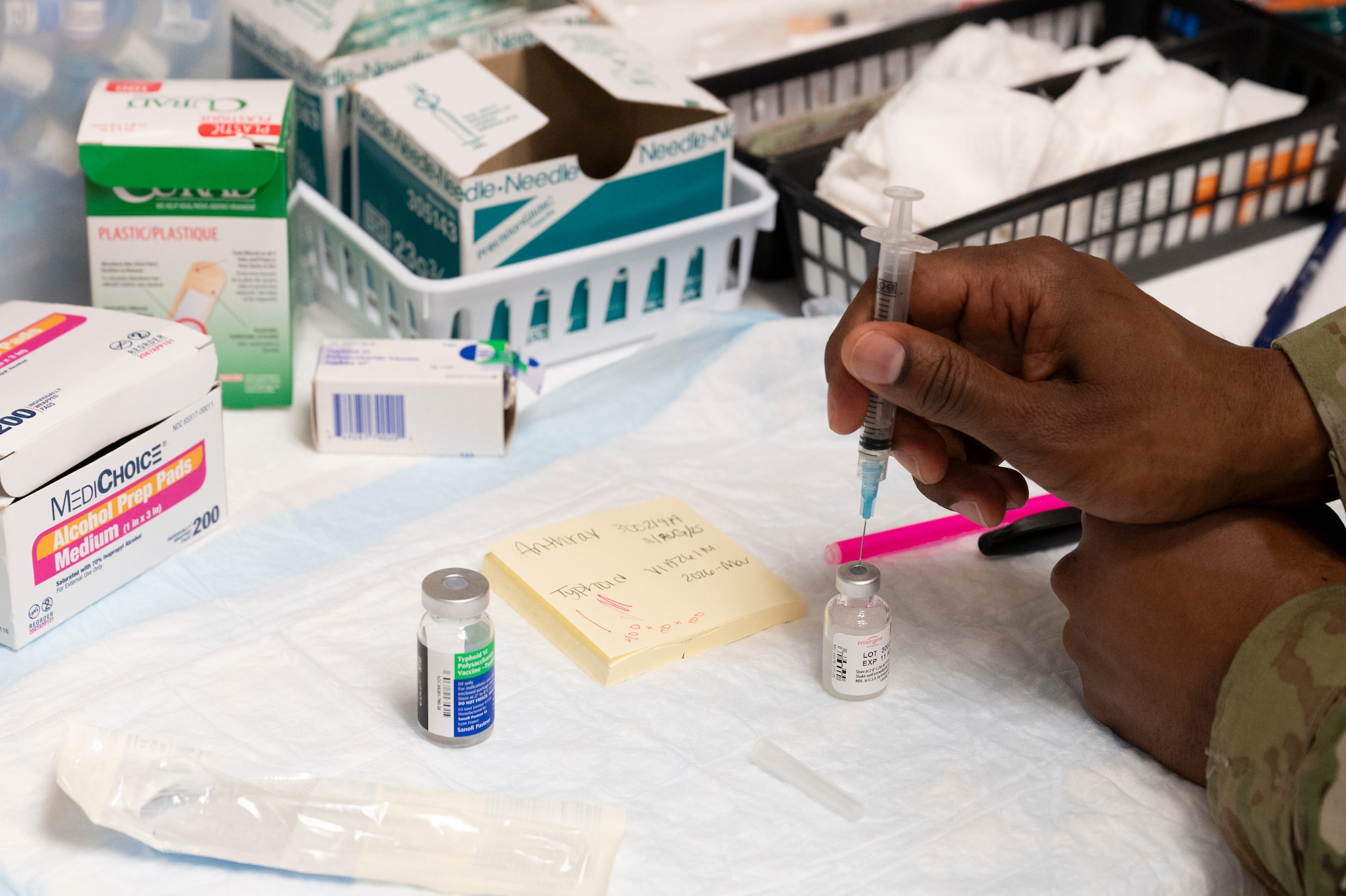 a man prepares a vaccine