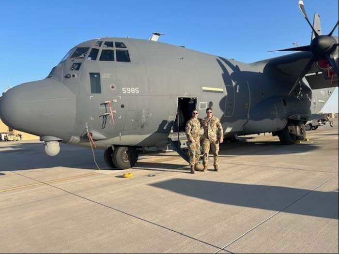 Image of two Airmen posing for a photo.