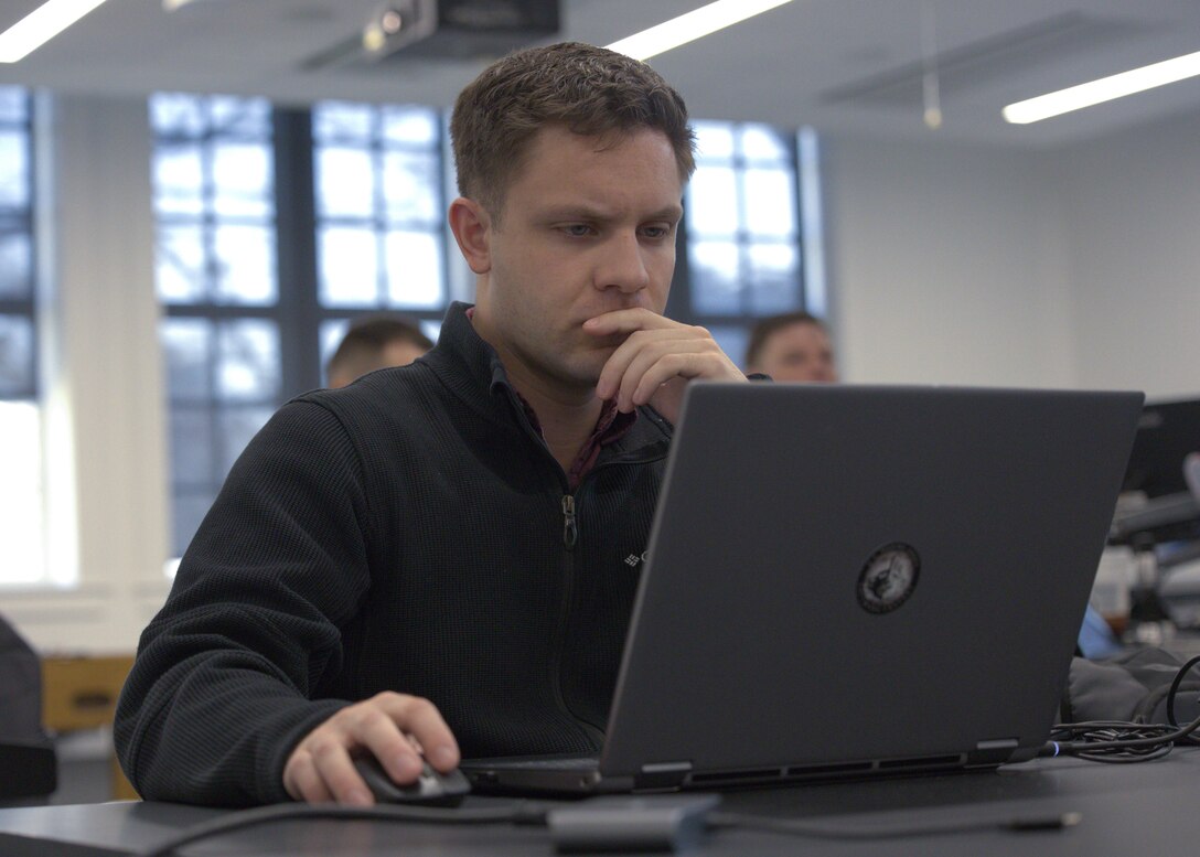 U.S. Marine Corps Cpl. Connor Oaks, assigned to the Marine Innovation Unit (MIU), Marine Forces Reserve, analyses data for the Augmented Reconnaissance and Estimate of the Situation (ARES) software being created at the Marine Corps Software Factory (MCSWF) in Austin, Texas, 17 - 29 March, 2025.  MIU Marines are assisting MCSWF in the development and production of software solutions that address critical needs for the Marine Corps, including an update to ARES that predicts helicopter landing zones based on topographical data. MIU is a Selected Marine Corps Reserve unit headquartered in Newburgh, N.Y. that accelerates the development and adoption of advanced capabilities across the Marine Corps. Oaks is a Miluwakee, Wisconsin native. (U.S. Marine Corps photo by Cpl. Orion Stpierre)